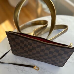 Elevate Your Essentials with Louis Vuitton Wristlet